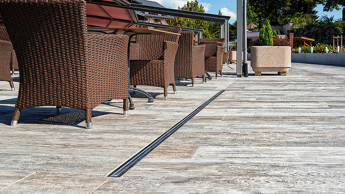 Як забезпечити ефективний стік води з тераси