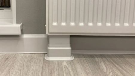 Image 0 Чем закрыть трубы под батареей