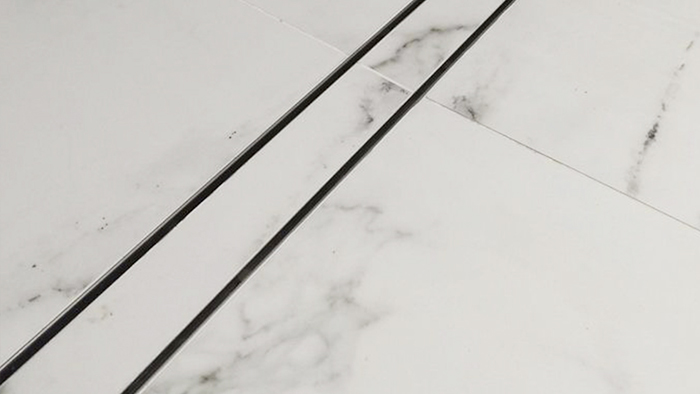 Який довжини має бути лінійний трап для душу