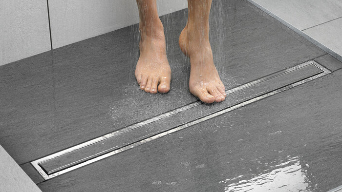 Душ с уклоном без поддона: практично и стильно